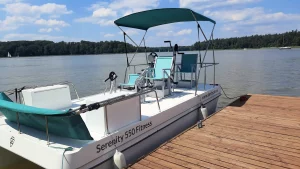 Serenity 550 Fitness - catamaran as big water at quay - portside deck view