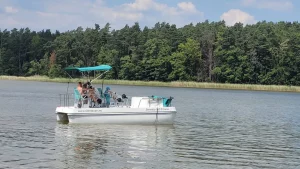 Serenity 550 Fitness - catamaran as big water bike on lake - starboard view