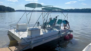 Serenity 550 Fitness - catamaran as big water bike at quay - portside bow view