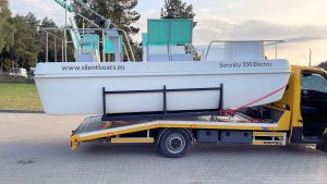 Serenity 550 Electric catamaran on truck - starboard view