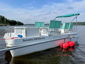 Serenity 550 Electric catamaran at quay - portside view