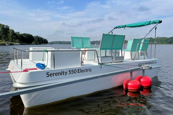 Serenity 550 Electric catamaran at quay - portside view