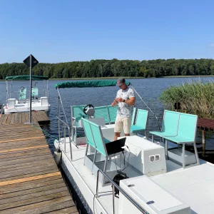 Serenity 550 Electric catamaran at quay with fitness version bow